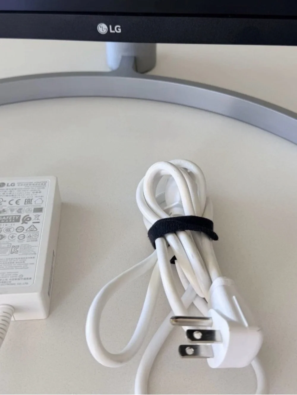 LG White Monitor with Silver Curved Stand
